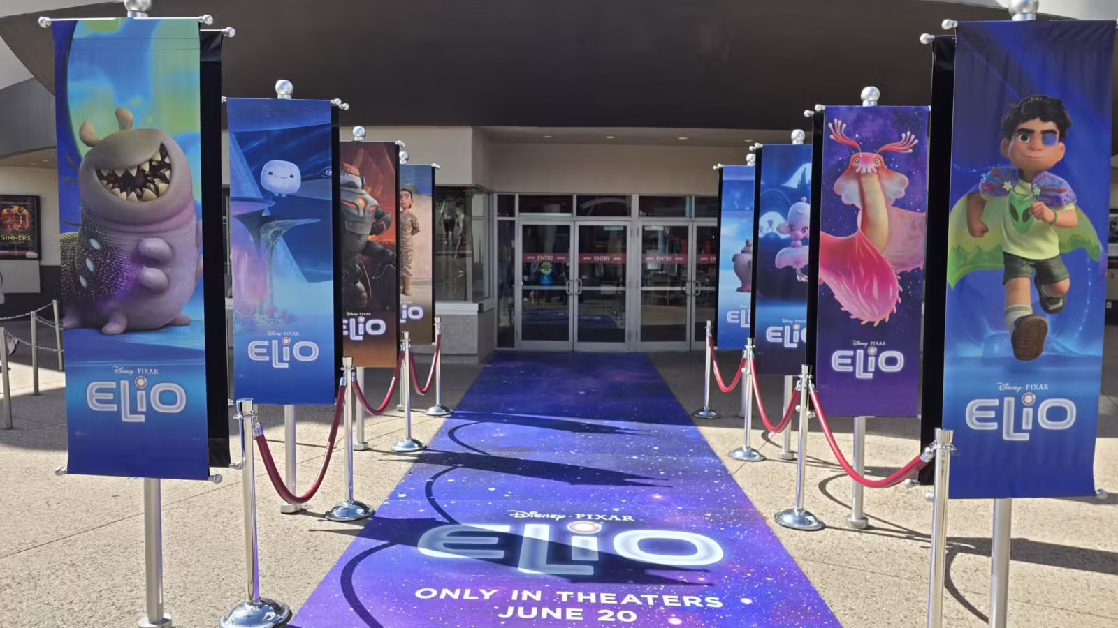 Disney  Pixar Elio Takes Over AMC 24 at Disney Springs with Marquee Popcorn Bucket and Glorp Vessel