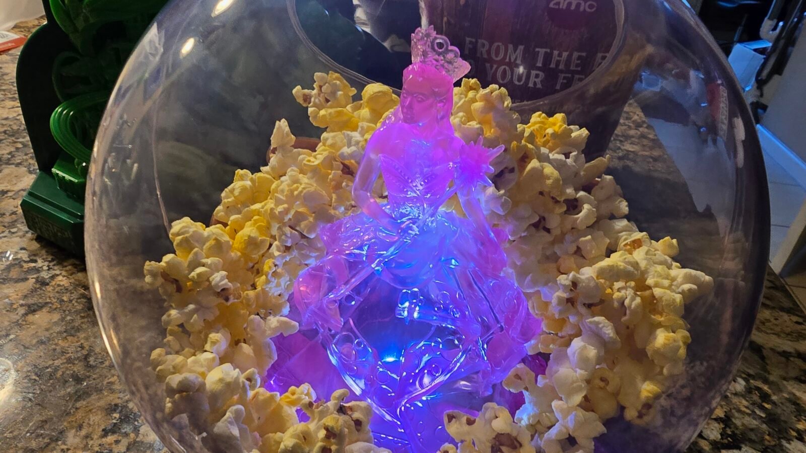 'I Couldn't Be Happier' Tap Here for Glinda Bubble Popcorn Bucket from AMC Theatres