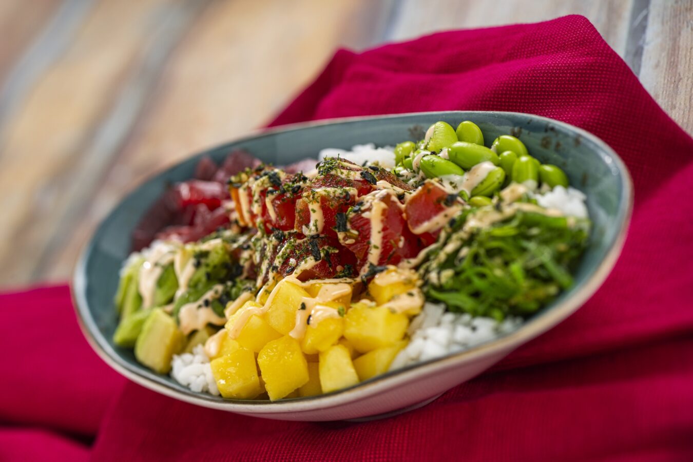 Tuna Poke Bowl Nectar World Nature A fresh new addition featuring edamame avocado mango and pickled red onions on sticky rice