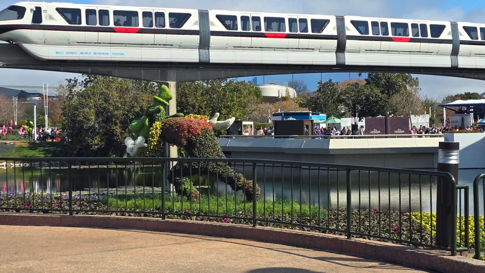 Topiary Goofy racing the Disney Monorail