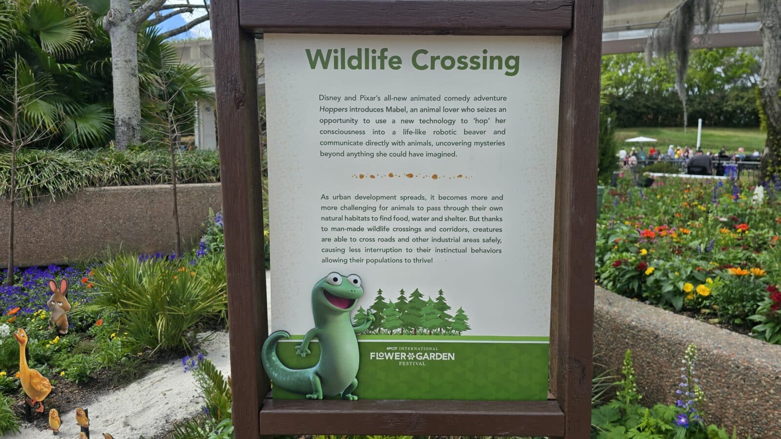 Wildlife Crossing Sign featuring Tom Lizard from Hoppers at Epcot Flower  Garden 2026