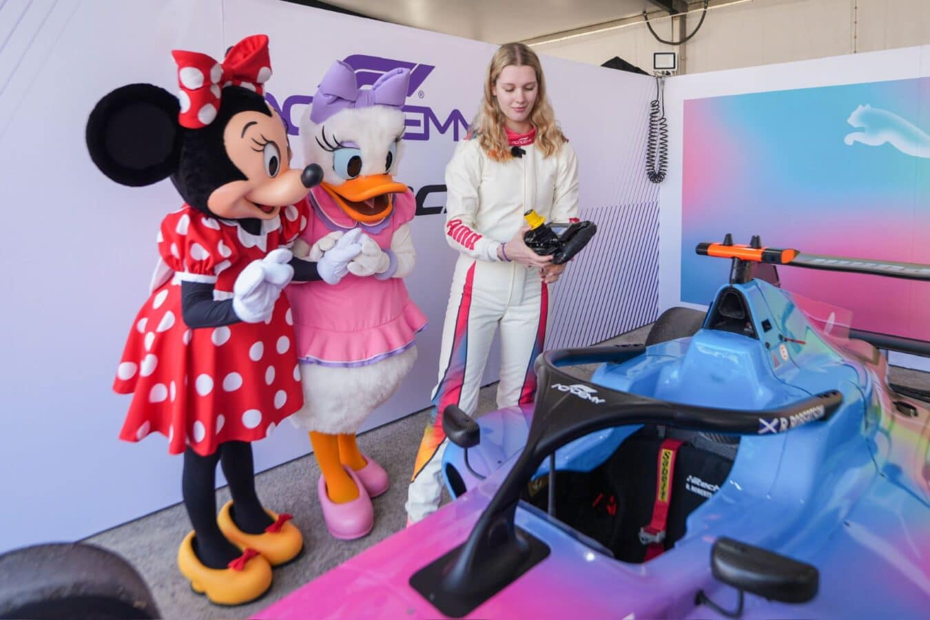 Daisy Duck and Minnie Mouse with Formula 1