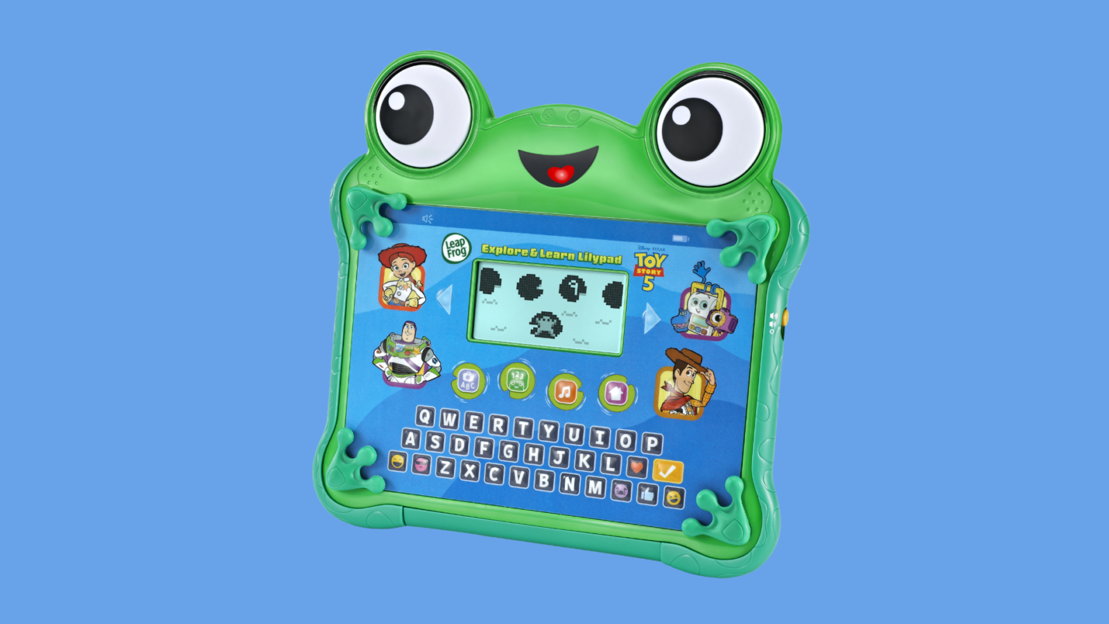 Green frog shaped LeapFrog kids tablet with a blue screen showing a game and keyboard icons on the display