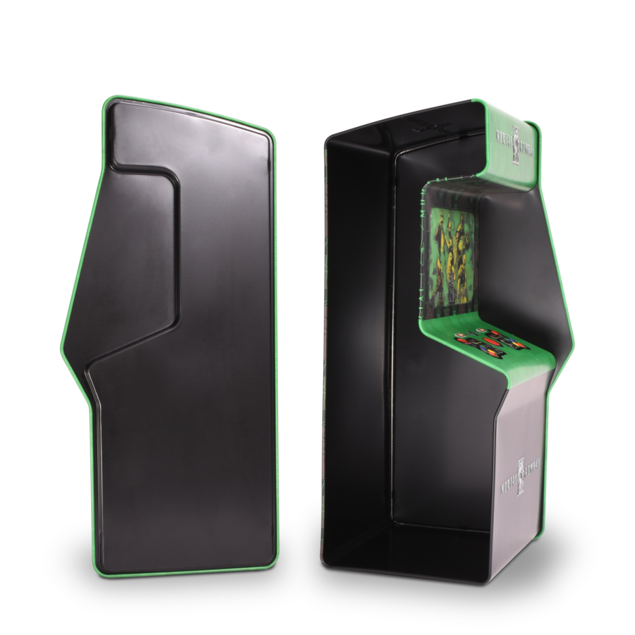 Two black arcade cabinet pieces with bright green edging one side panel and the other showing an inner unit with a screen and control surface inside