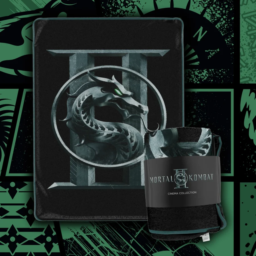 Mortal Kombat II Cinema Collection blanket with dragon emblem shown on a dark panel with a green and black background plus packaging strap