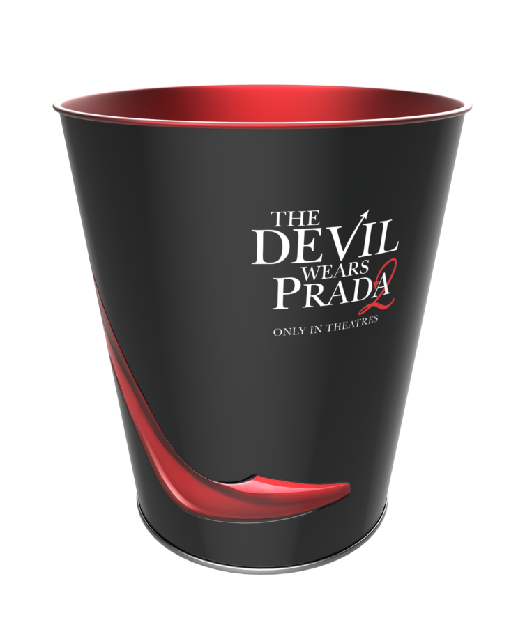 Black promotional cup with a red interior and red ribbon design featuring the text THE DEVIL WEARS PRADA and ONLY IN THEATRES