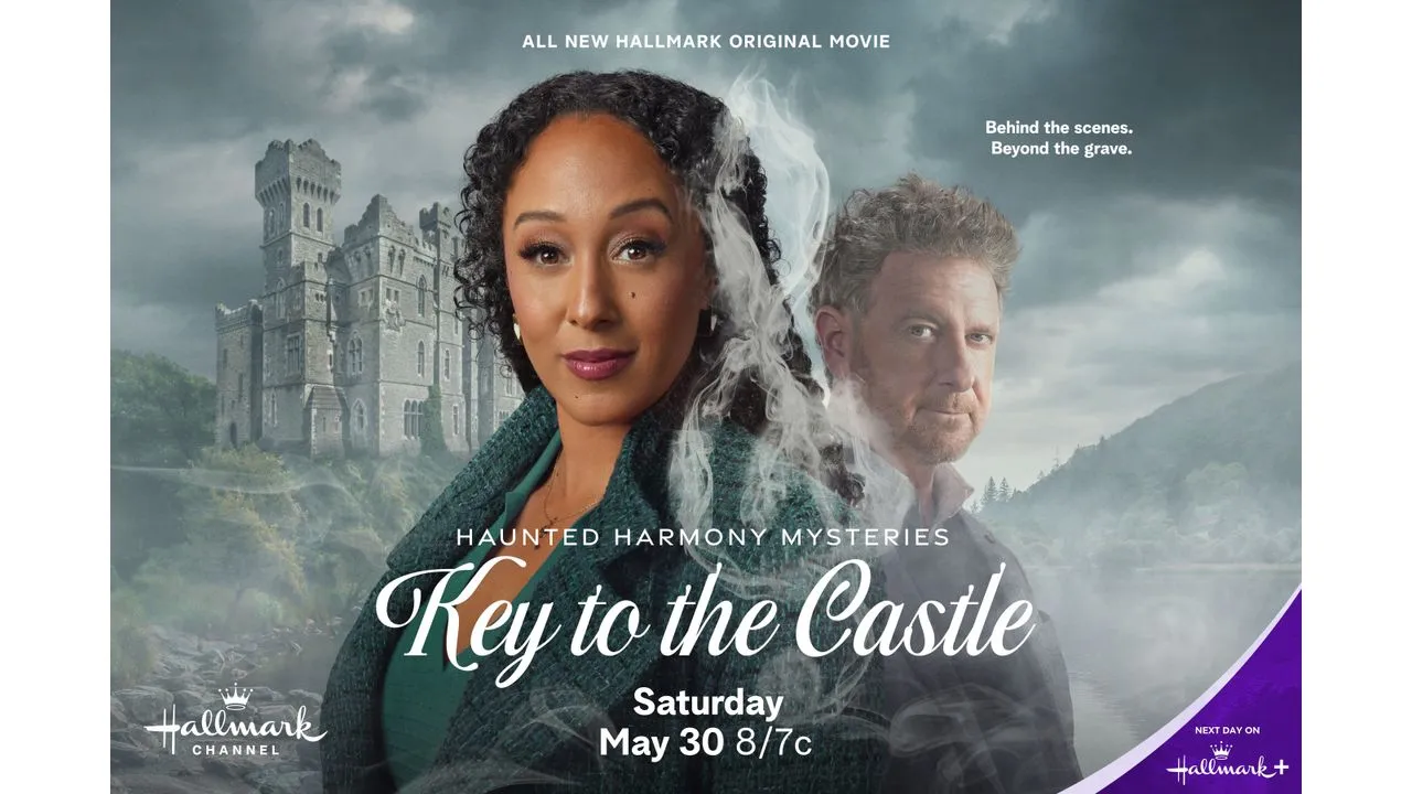Promotional image for Hallmarks Key to the Castle a woman in the foreground with a castle and a man behind in a misty landscape