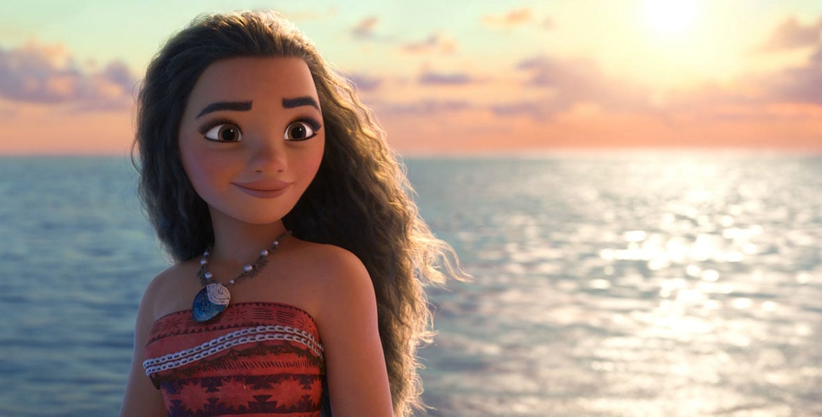 Moana inspired animated woman with long wavy hair on a beach at sunset by the calm sea wearing a red patterned strapless dress and necklace