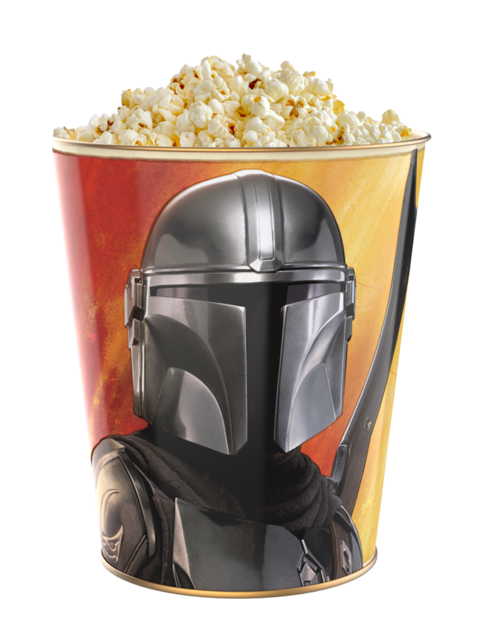 Popcorn bucket with a metallic helmet graphic on an orange background overflowing with popcorn earlier rim