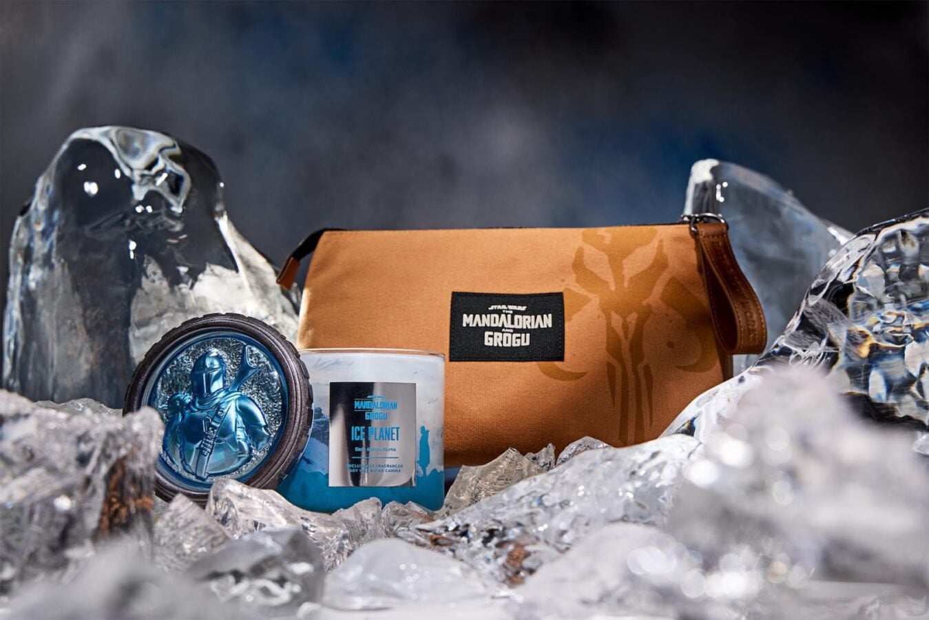 Mandalorian Grogu themed brown pouch among ice with a blue Grogu speaker and an Ice Planet candle nearby