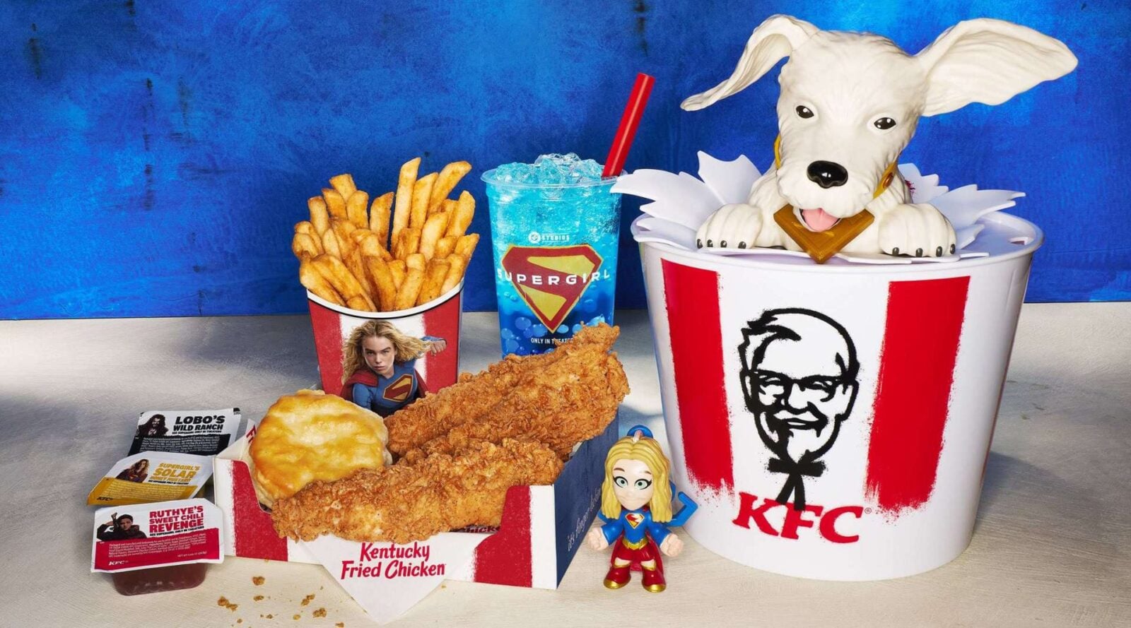 KFC Supergirl Collab Rumored for June 8 With Krypto Bucket Themed Sauces and Blind Bag Keychains