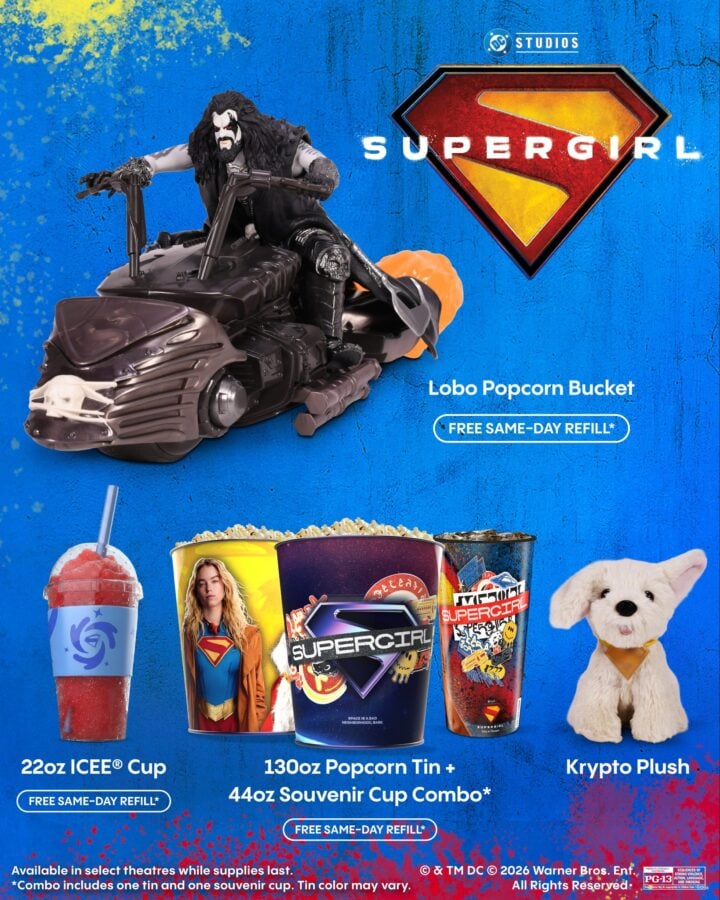 71228701314286011193038956419175554321418205n Fantasy Land News Action figure rides a black motorcycle in front of a bright blue background and a large red yellow superhero emblem with popcorn cups and a puppy at the bottom edge