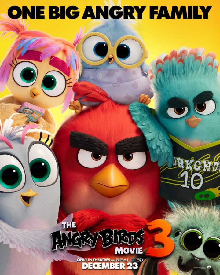 Movie poster for The Angry Birds Movie 3 a group of colorful birds led by a red angry looking bird posing against a yellow background title and release date are visible December 23