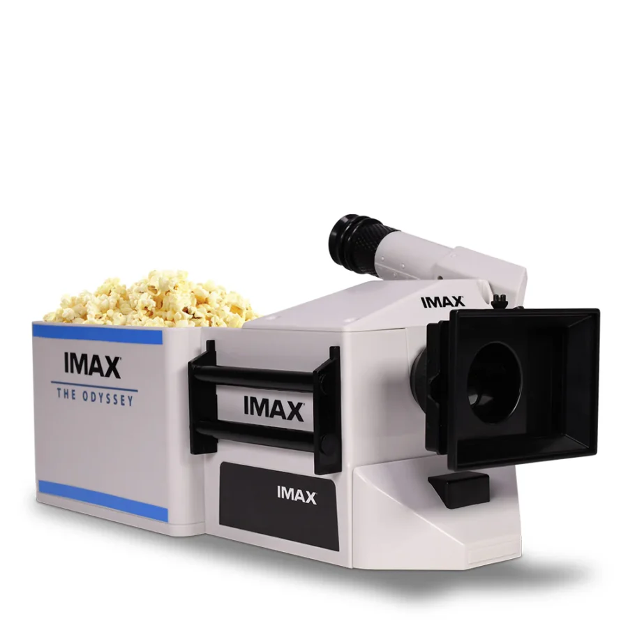 ImaxPB21781281600016 Fantasy Land News IMAX The Odyssey popcorn bucket with a white IMAX projector camera model beside it