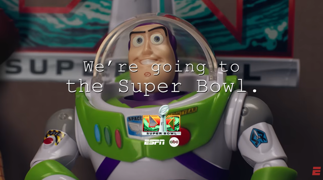 Buzz Lightyear toy in a promo frame with the caption Were going to the Super Bowl and Super Bowl logos ESPNABC