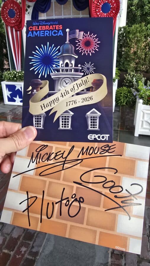 Poster celebrates 4th of July with fireworks and a clock tower reading Happy 4th of July 1776 2026 at EPCOT Behind the scenes stage decor visible