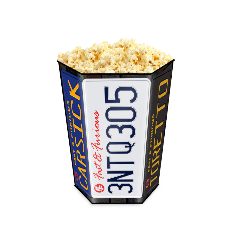Popcorn overflowing from a popcorn box filled with buttered kernels Informative