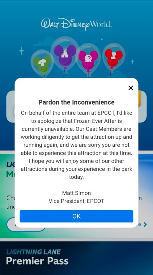 Mobile screen showing a white rounded pop up titled Pardon the Inconvenience with an apology from Matt Simon EPCOT VP over a blue Disney World background with balloons