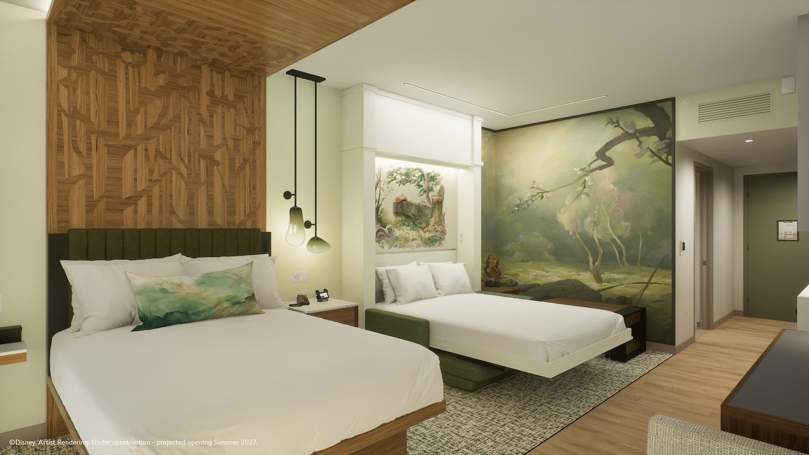 Hotel room with two queen beds green headboards and a large nature mural on the wall to the right plus pendant lights and a wood accent wall