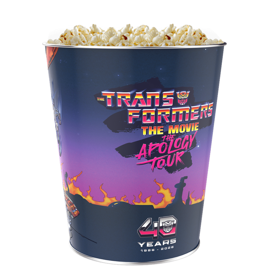 Popcorn bucket decorated with Transformers The Movie branding and a 40th anniversary design filled with popcorn now