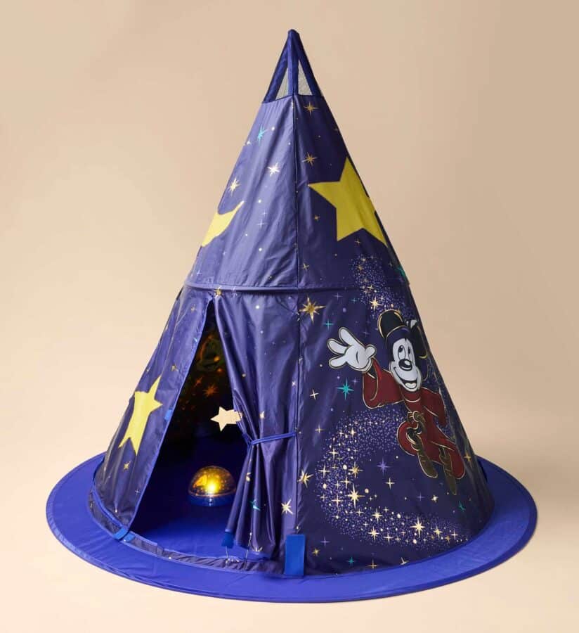 Blue cone shaped party hat with yellow stars and a Mickey Mouse illustration