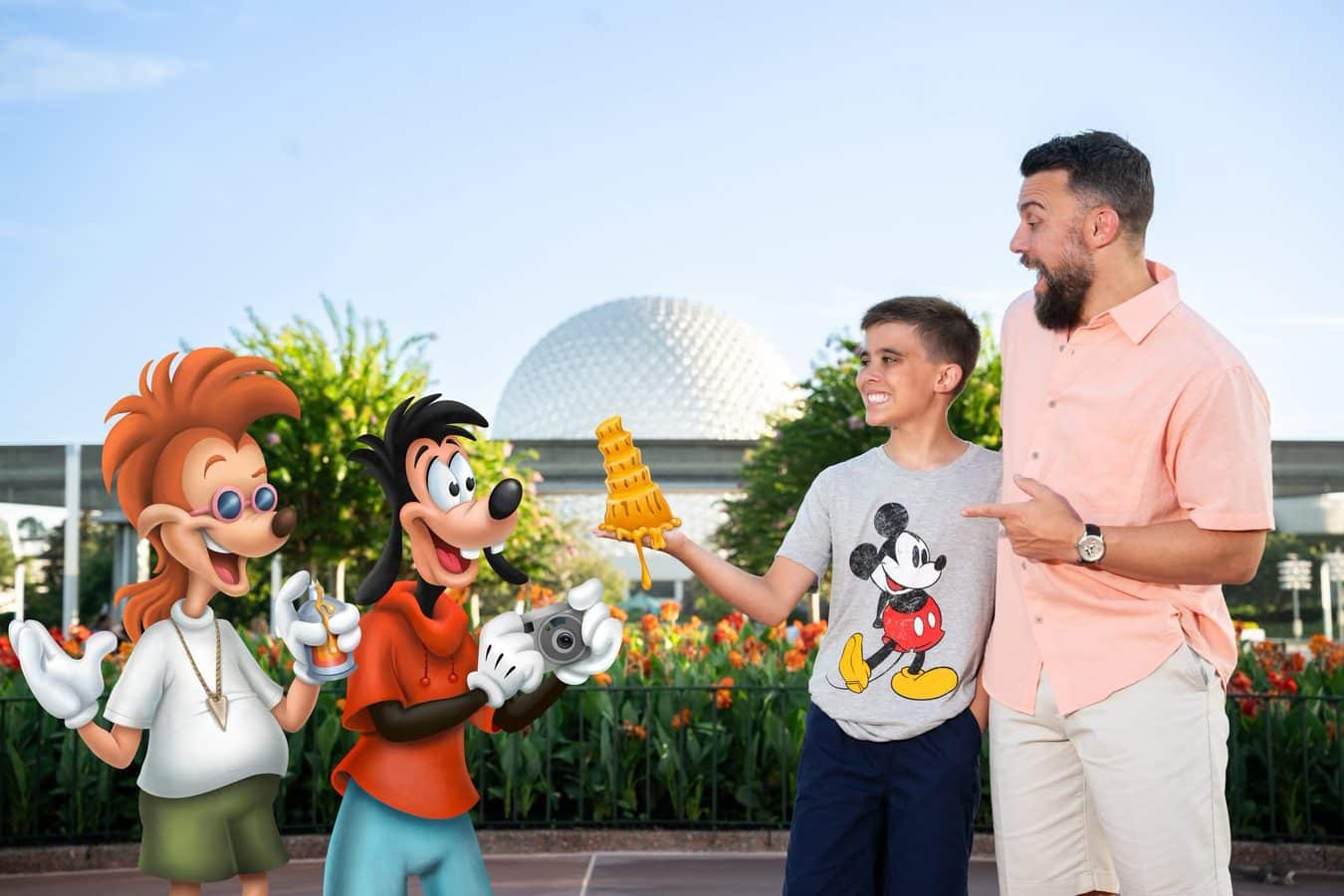 Two men interact with lifesize Disney characters Daisy Duck and Goofy outdoors smiling at a sunny park setting