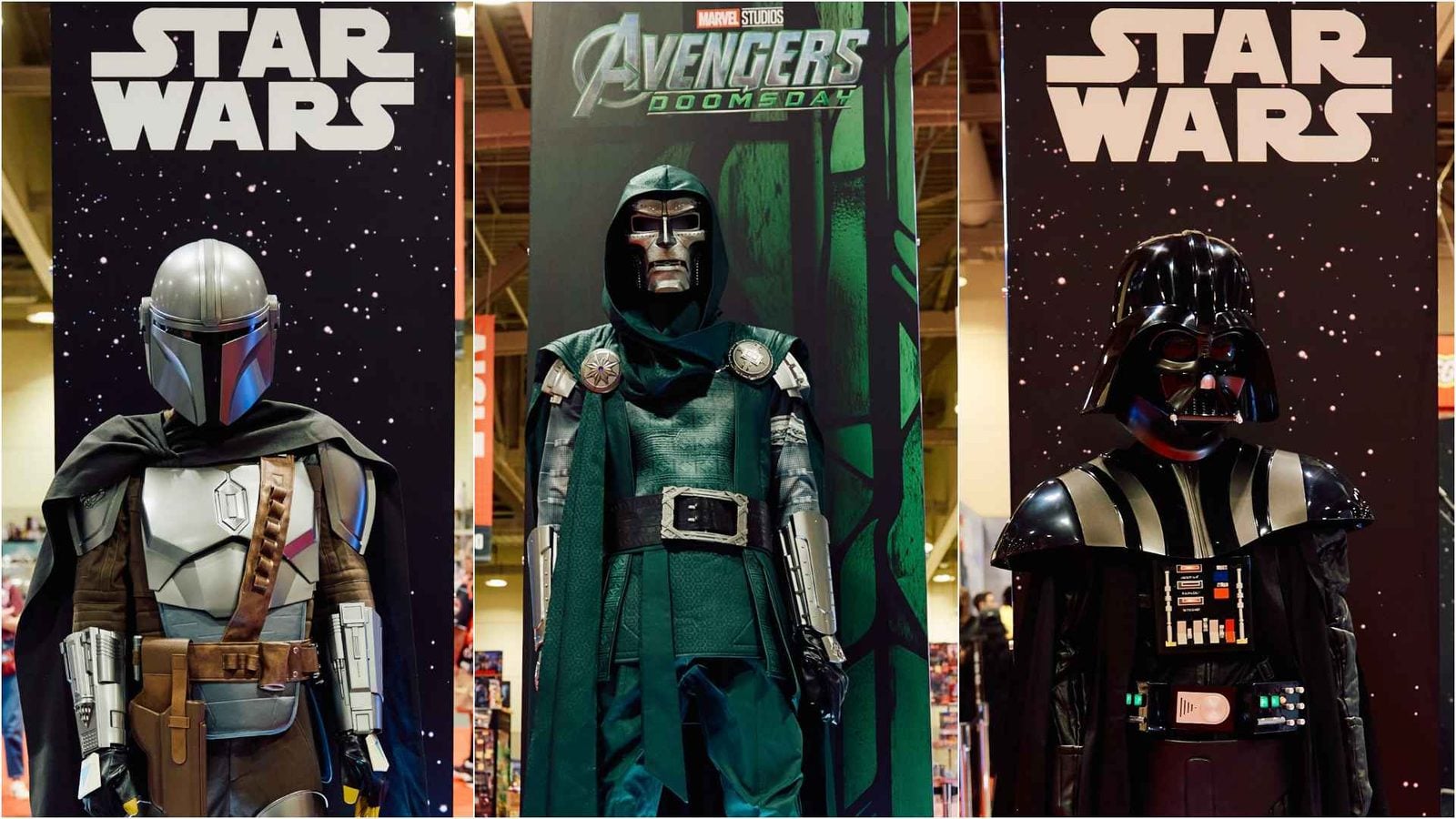 Three lifesize figures on display a Mandalorian on the left Doctor Doom in the center and Darth Vader on the right with Star Wars banners in the background