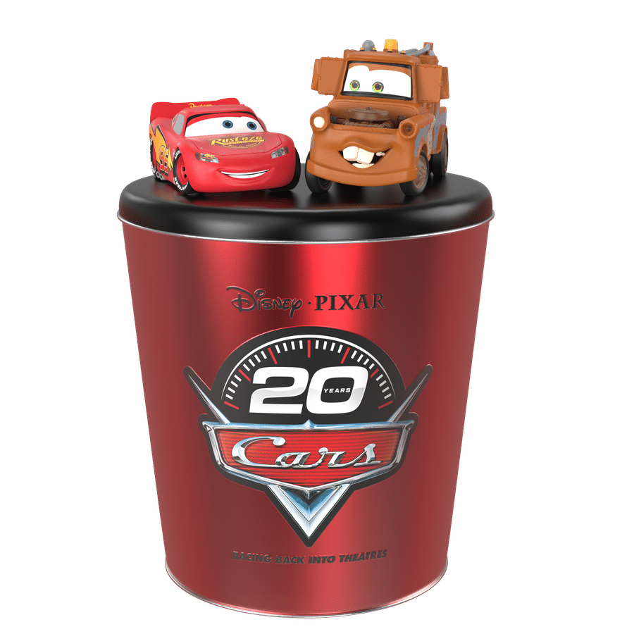 Lightning McQueen red and Mater orange sit on a glossy red trophy cup with DisneyPixar Cars branding visible on the side