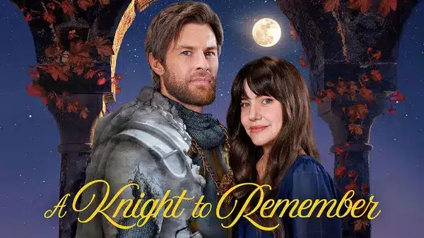 1 Fantasy Land News Romantic book cover with a knight in armor and a woman beneath a moonlit arch title A Knight to Remember