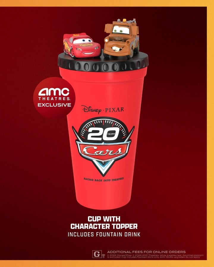 Promotional red Cars themed cup with two character toppers on the lid and an AMC Theatres Exclusive badge on the side