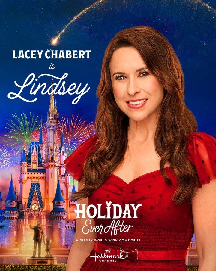 Poster featuring Lacey Chabert in a red dress with a castle and fireworks in the background promotes Hallmarks Holiday Ever After