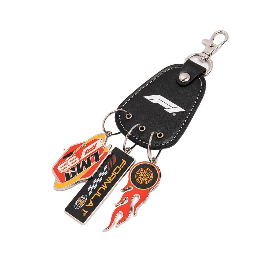 Keychain wallet with attached metal hardware and multiple racing themed tags featuring bold red black and orange graphics