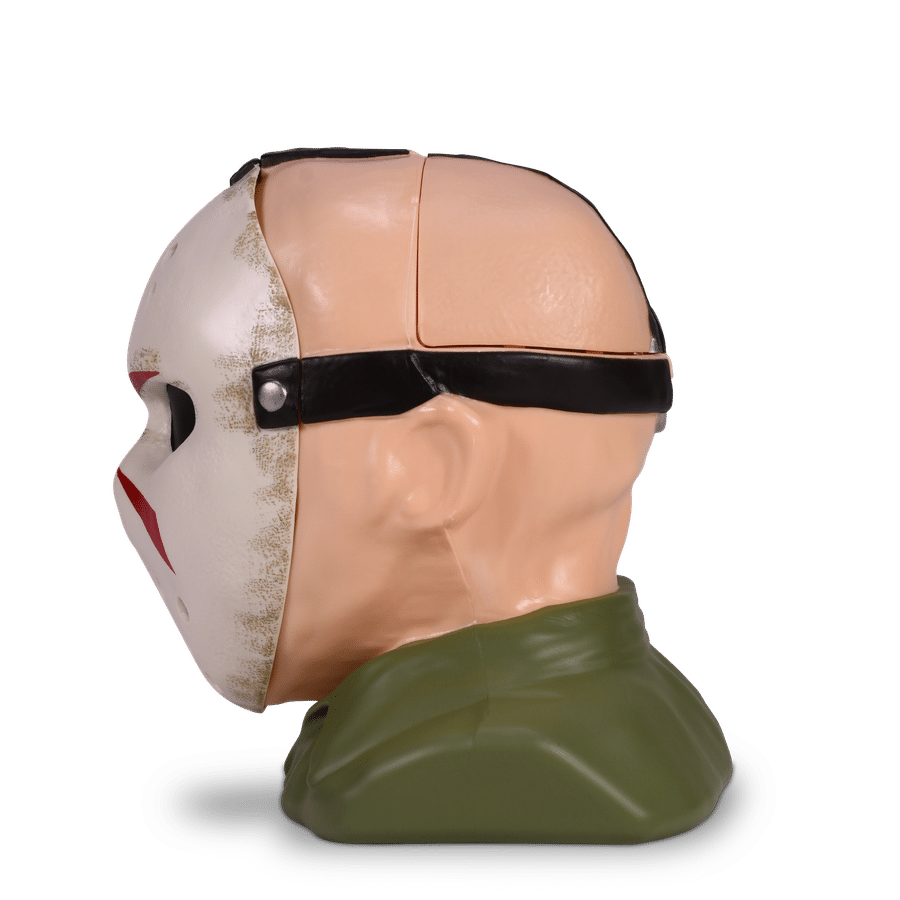 Close up of a mannequin head wearing a white weathered helmet with a black strap