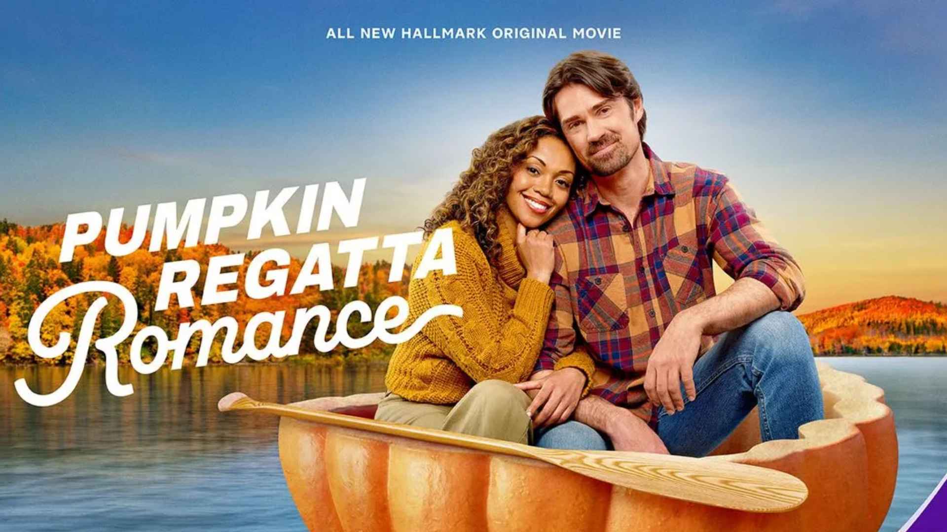 Couple in a pumpkin-shaped boat with a paddle on a lake, autumn trees in the background, Hallmark romance poster.
