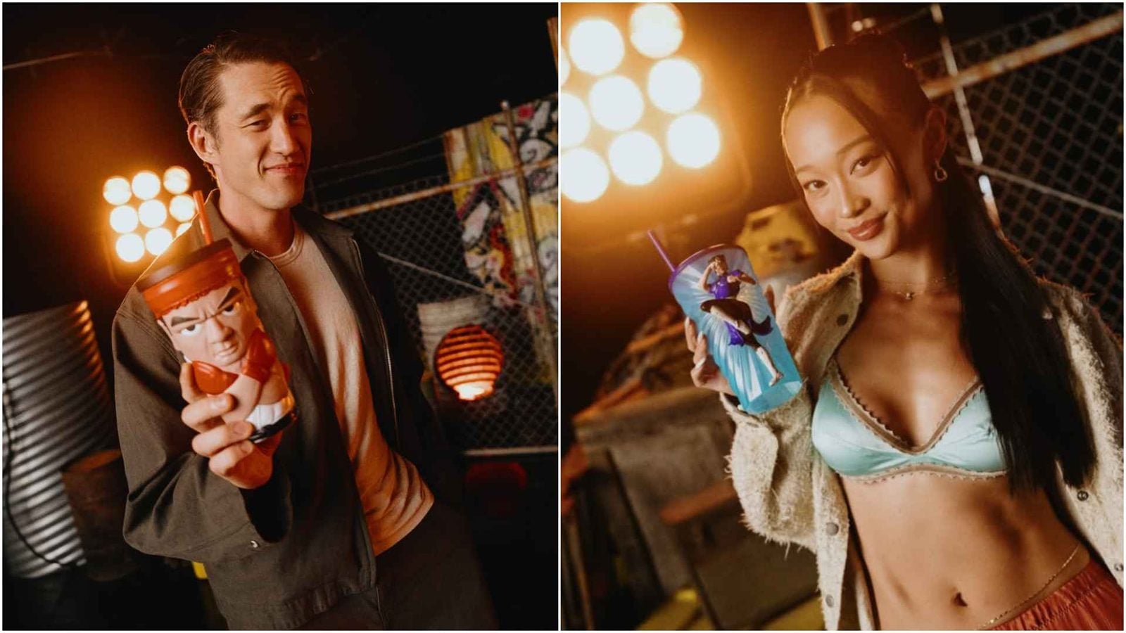 Two people posing in a dim festive setting each holding a novelty cup a man with an orange tiki cup and a slight smile on the left a woman with a blue surfing cup on the right