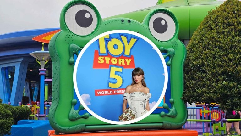 Green frog-shaped ride entrance with a circular poster for Toy Story 5 World Premiere and a woman in a white dress standing in front.