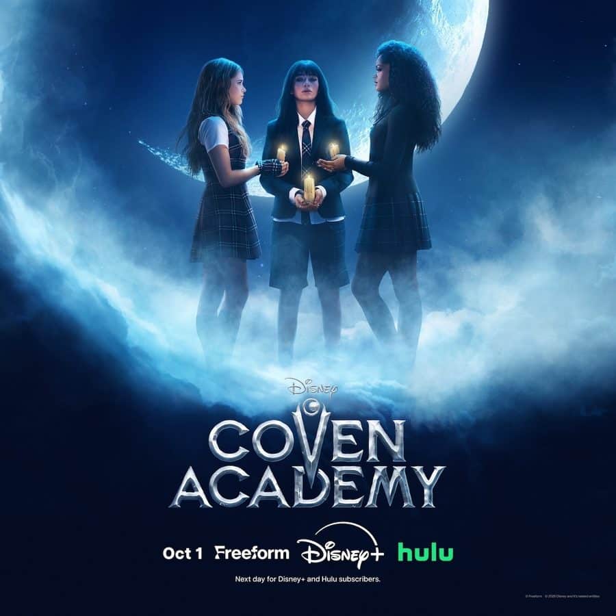 Three schoolgirls in uniforms stand in a misty blue moonlit setting each holding a lit candle forming a trio centered under a large moon