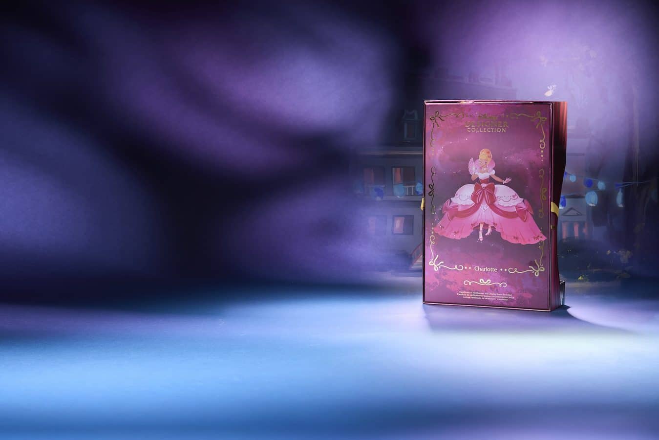 Pink princess themed product box on a blue lit stage with purple fog in the background