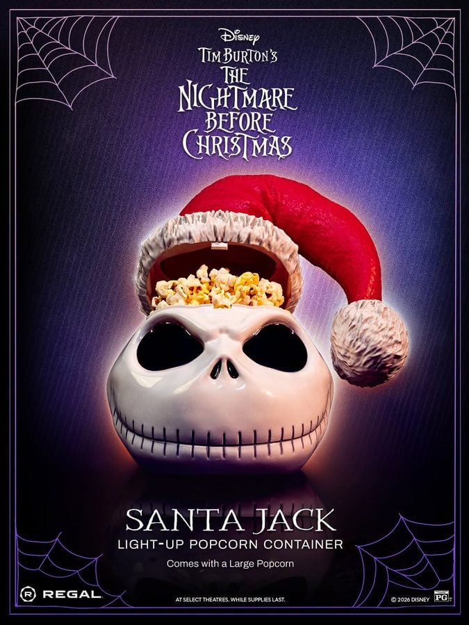Poster for The Nightmare Before Christmas featuring a white skull wearing a Santa hat with popcorn spilling from the top glowing purple background