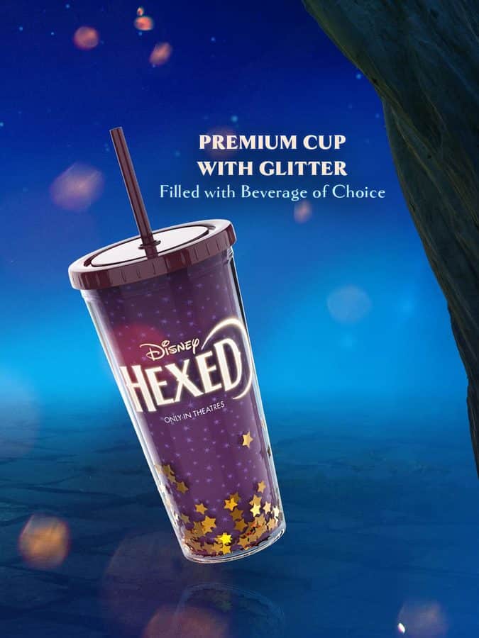 Regal Hexed Premium Cup with Glitter a purple tumbler with gold stars and a straw