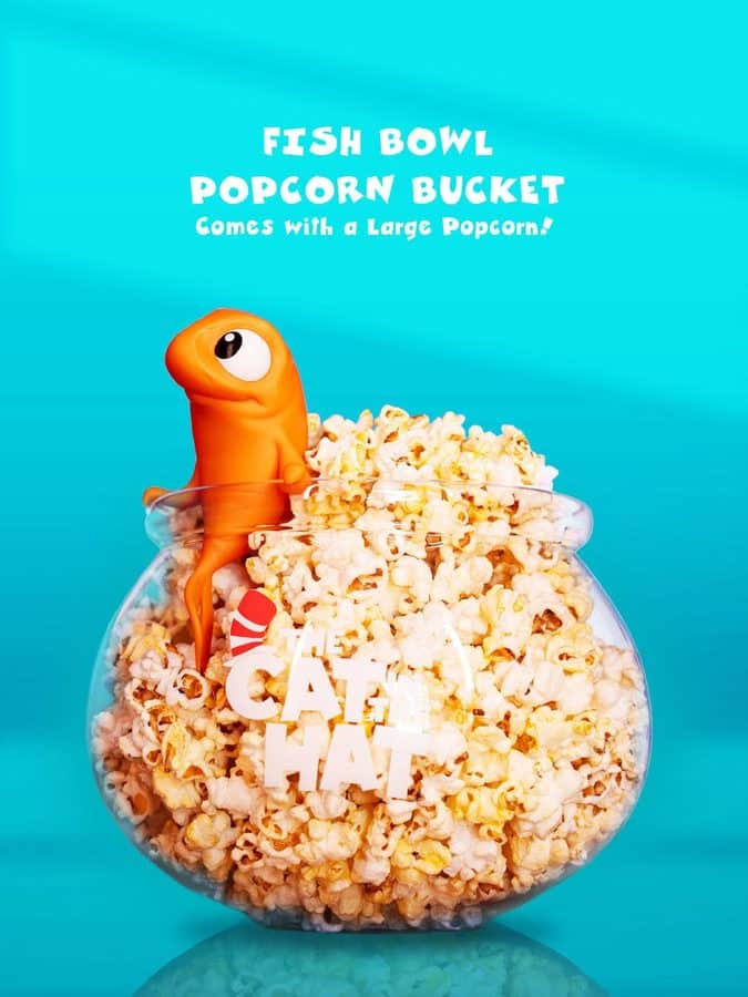 Regal Fish Bowl Popcorn Bucket with Fish sitting on the rim filled with popcorn