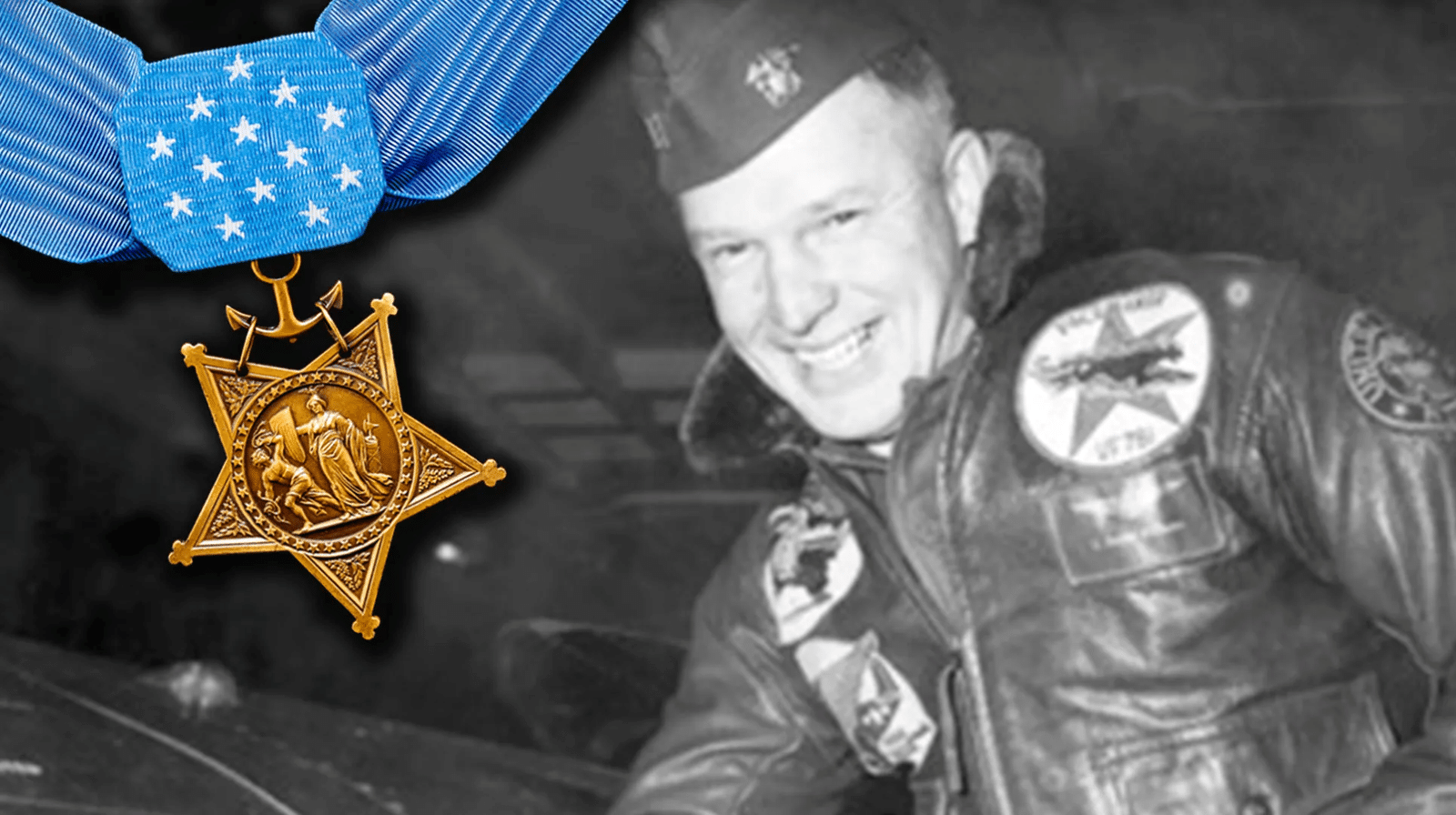 Smiling soldier in a patch covered uniform with a gold star medal on a blue ribbon in the foreground