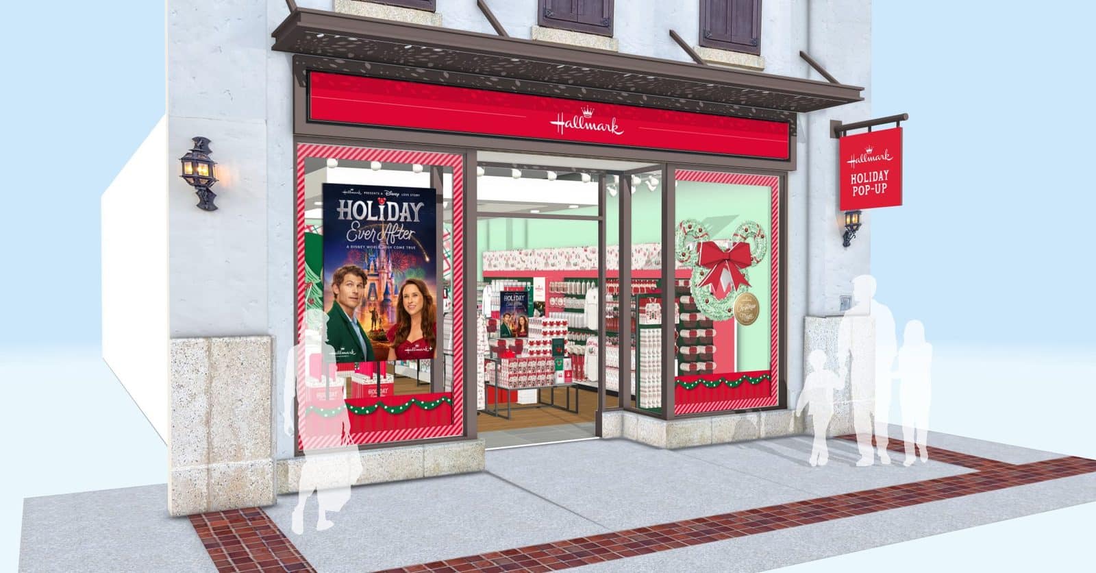 Hallmark Holiday Pop Up storefront with red signage and festive window displays featuring a Holiday Ever After poster and holiday decor