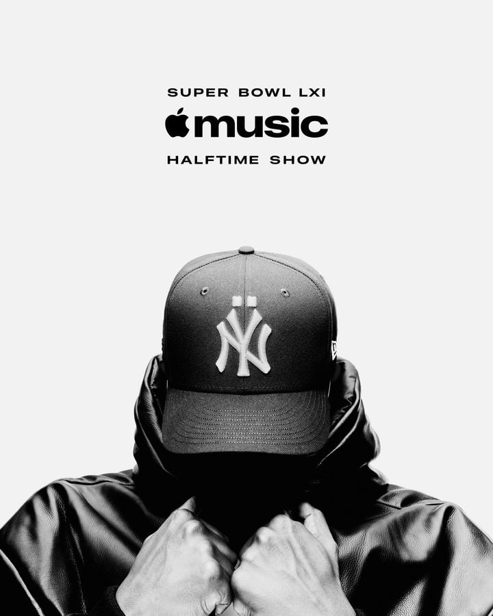 Promotional image for Apple Musics Super Bowl LVI halftime show featuring a cap wearing figure in grayscale beneath text