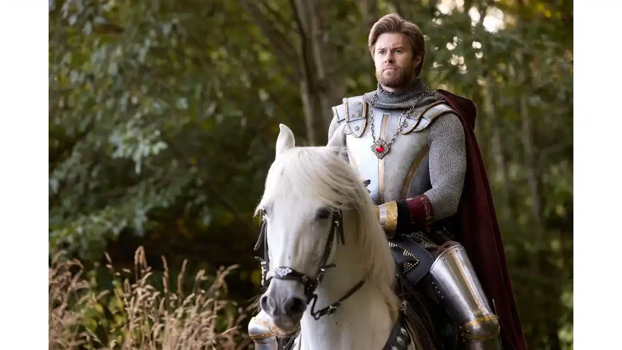 ktr4 Fantasy Land News Knight in full plate armor rides a white horse through a forest clearing